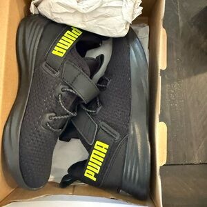 PUMA Black Sneakers with Yellow Logo